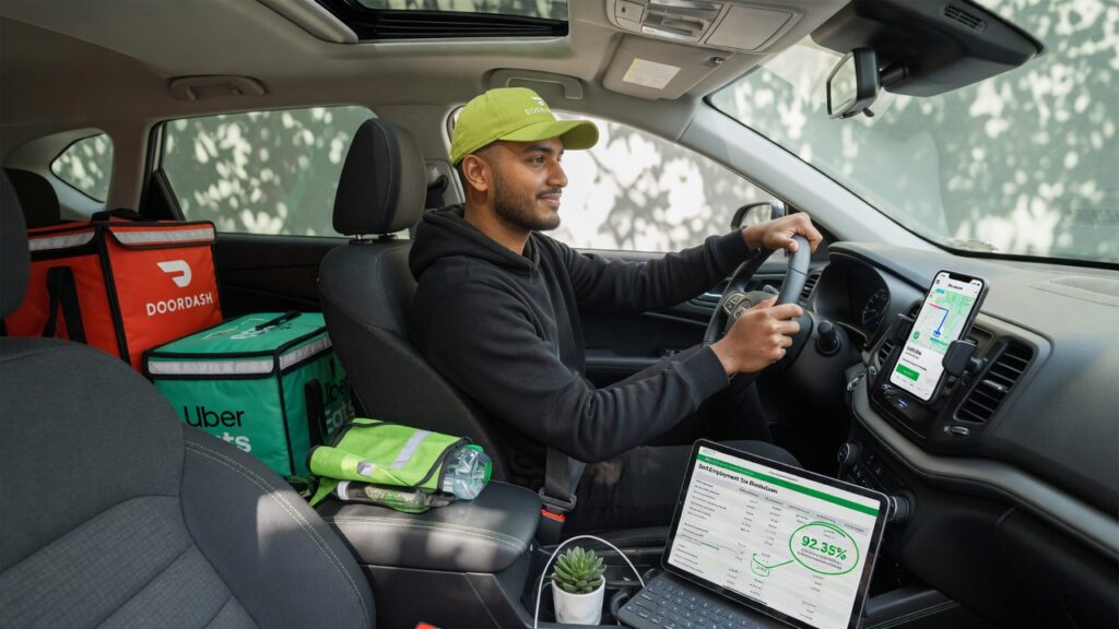 Self-Employment Tax Explained for Uber, DoorDash & Freelance Drivers Uber driver reviewing self employment tax guide with mileage log and phone